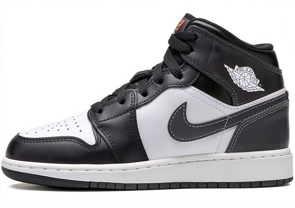 Installing Nike Boys Basketball Shoes Authentic Black/Iron Grey-white on a wooden desk